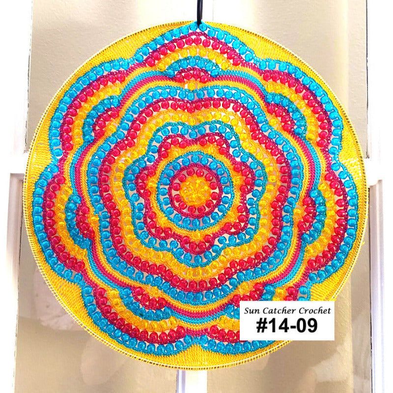 Colorful spiral sun catcher with a label on a white background