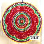 Colorful circular sun catcher with spiral pattern on a white background
