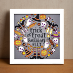 Halloween-themed framed artwork with text and icons on a gray background