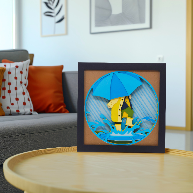 Framed artwork of a child with an umbrella on a table in a living room.