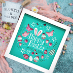 Framed 'Happy Easter' artwork with decorative elements on a textured surface.