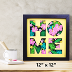 Decorative wall art with floral letters spelling 'HOME' on a wooden surface.