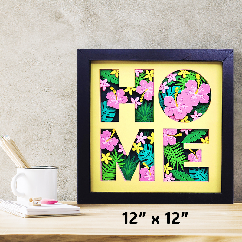 Decorative wall art with floral letters spelling 'HOME' on a wooden surface.