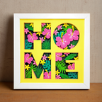Decorative wall art with floral letters spelling 'HOME' on a yellow background.