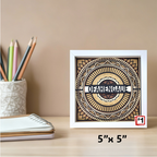 Decorative wall art with geometric design and text on a beige background