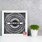 Framed black and white artwork with 'FALEFA' branding on a gray wall.