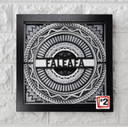 Decorative wall art with geometric design and 'FALEAFA' branding on a textured wall.