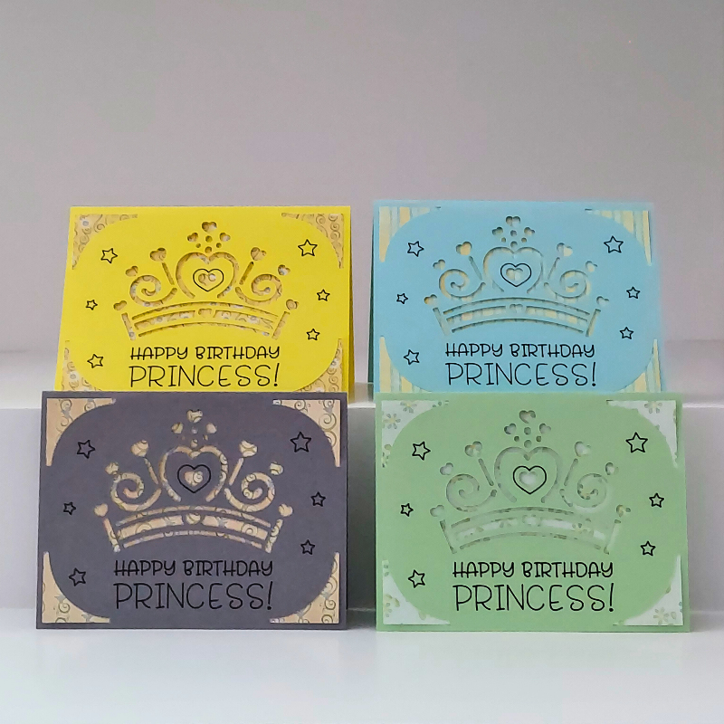 Four 'Happy Birthday Princess!' cards in yellow, blue, gray, and green with a crown design on a white background.
