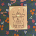 Card with castle design and 'Happy Birthday Princess!' text on a floral background