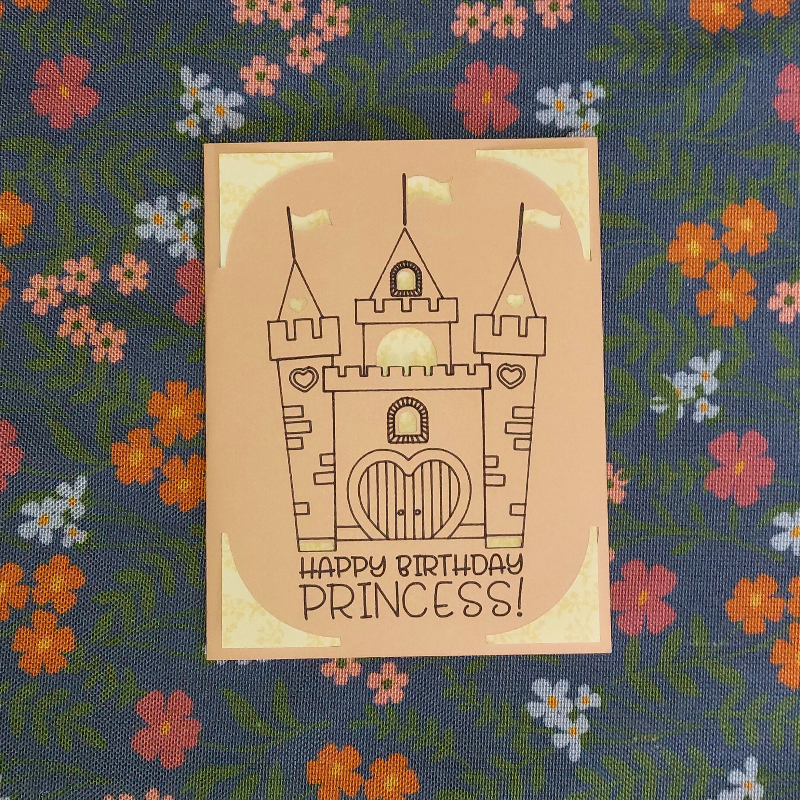 Card with castle design and 'Happy Birthday Princess!' text on a floral background
