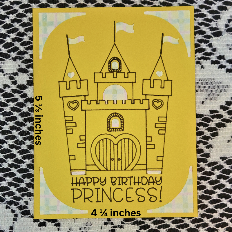 Yellow card with a castle design and 'Happy Birthday Princess!' text on a textured black and white background.