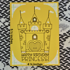 Yellow card with a castle design and 'Happy Birthday Princess!' text on a textured black and white background.