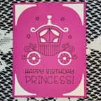 Pink birthday card with a princess carriage design and 'Happy Birthday Princess!' text on a textured background.