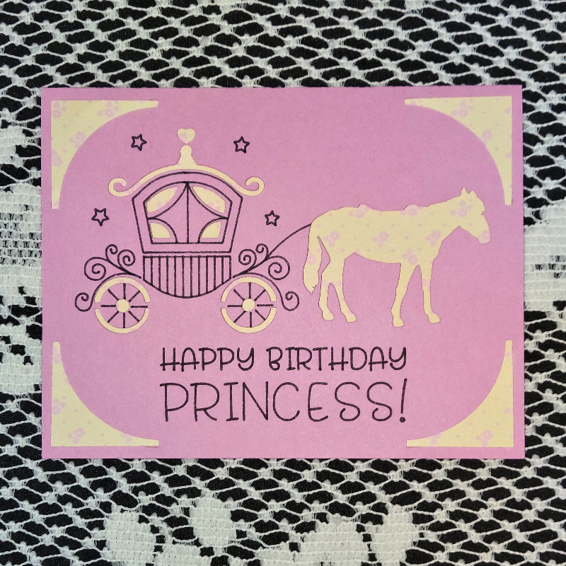 Pink birthday card with gold carriage and horse illustration on a textured black and white background.