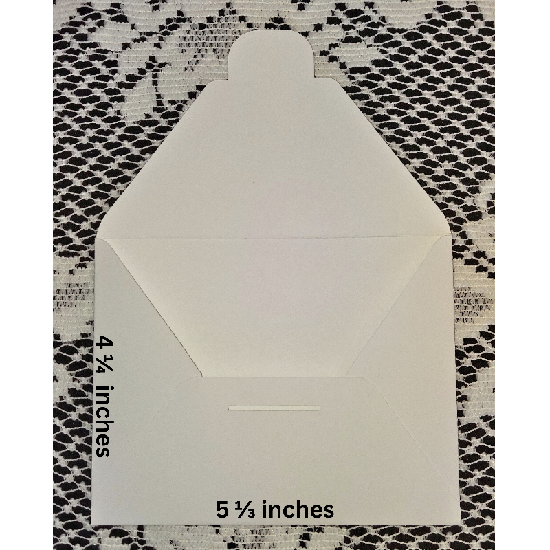 White envelope with measurements on a patterned background