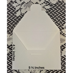 White envelope with measurements on a patterned background