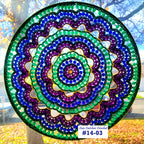 Colorful beaded mandala with a blurred outdoor background