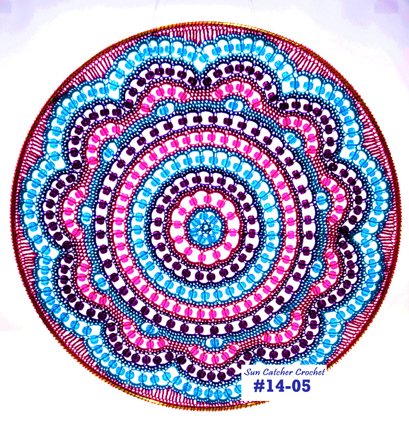 Colorful circular pattern with concentric circles on a white background, featuring the brand 'Sun Catcher Crochet'.
