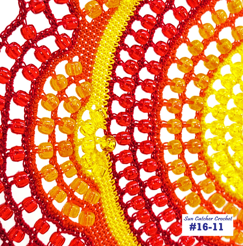 Close-up of red and yellow beaded crochet pattern with 'Sun Catcher Crochet' branding.