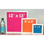 Three picture frames with different sizes displayed next to a water bottle.