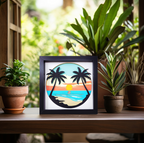 Framed artwork of palm trees and a sunset on a table with plants in the background