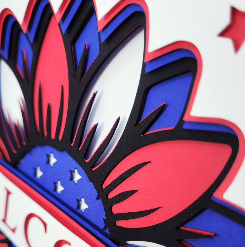 Close-up of a decorative wall piece with red, blue, and white colors.