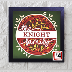 Framed artwork with 'the KNIGHT family' text on a green background