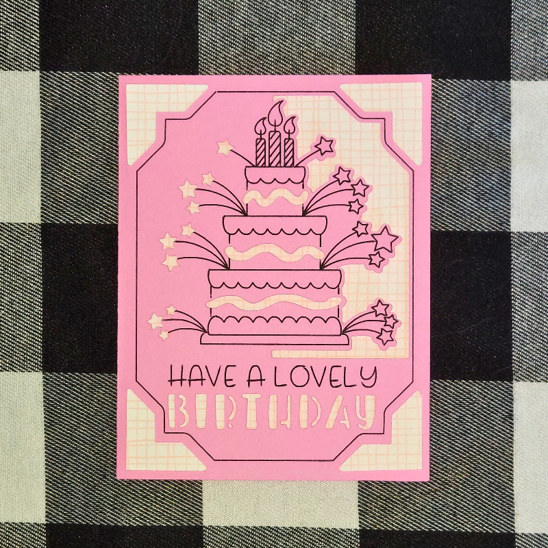 Pink birthday card with cake illustration and 'Have a Lovely Birthday' text on a checkered background.