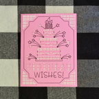 Pink birthday card with cake and candles design on a checkered background