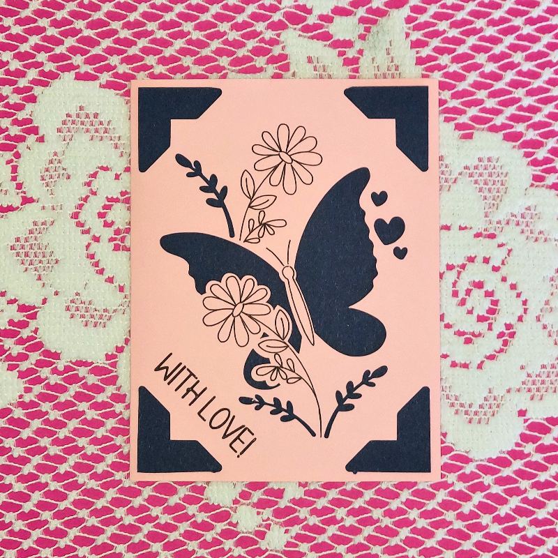 Card with butterfly and floral design on a pink background, featuring the text 'WITH LOVE!' on a patterned background.