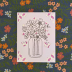 Floral design in a jar on a pink card with a floral patterned background