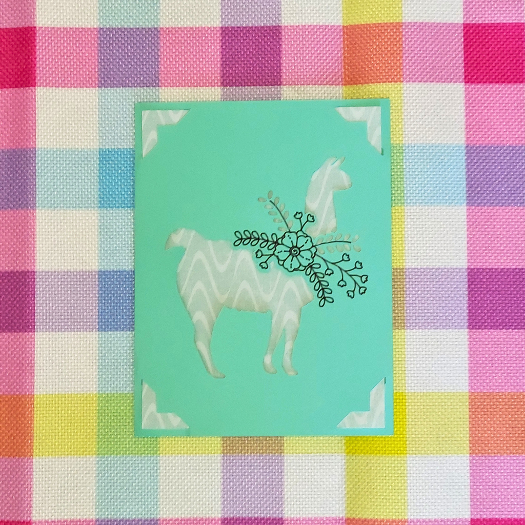 Card with a geometric horse design on a colorful checkered background
