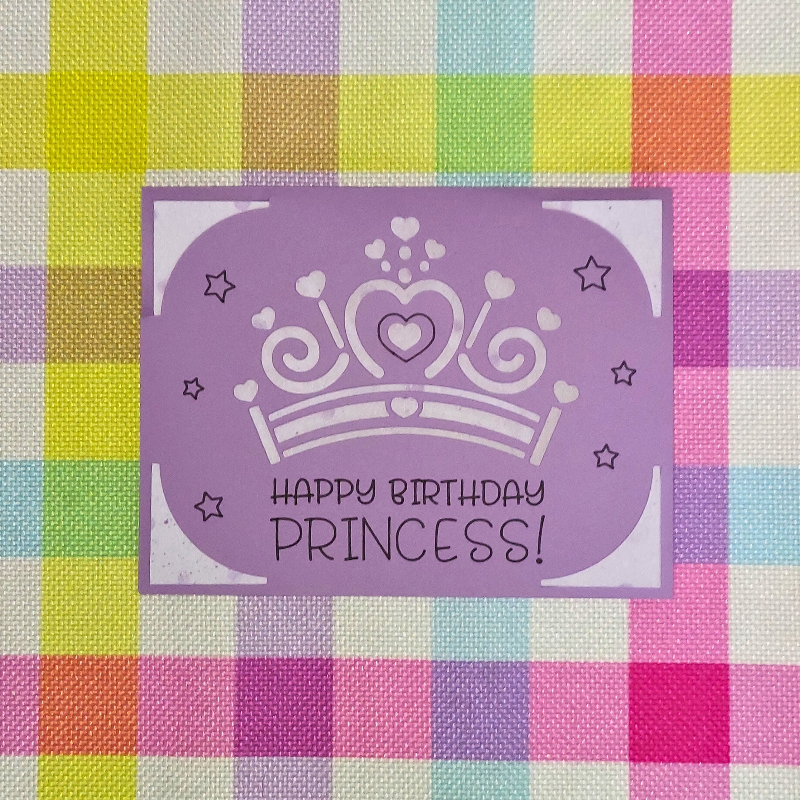 Happy Birthday Princess card with a crown design on a colorful checkered background