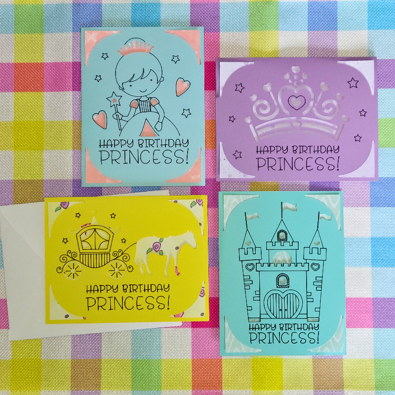 Four colorful birthday cards for a princess on a checkered fabric background