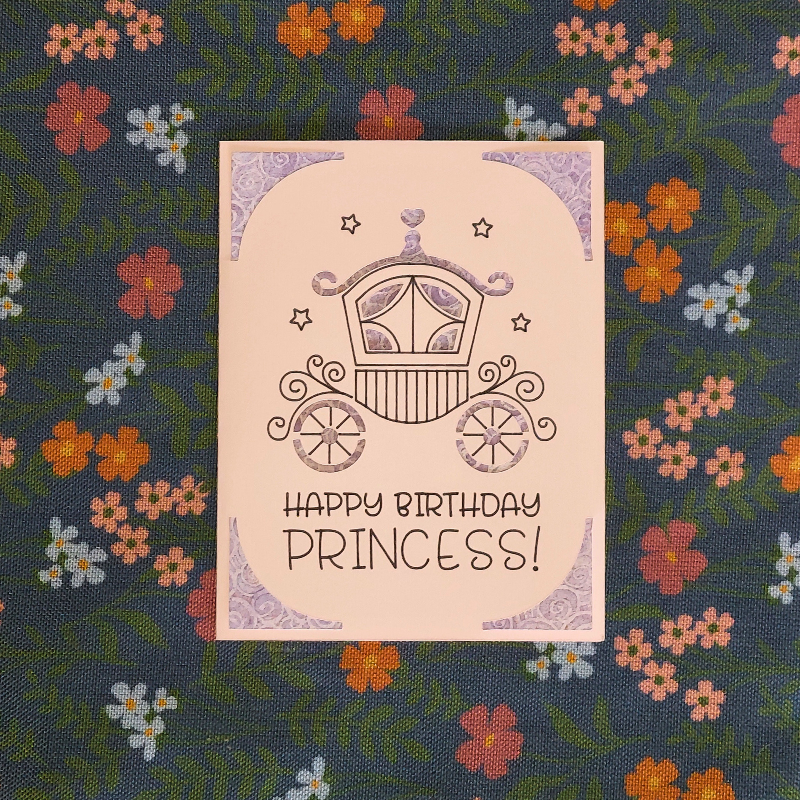 Birthday card with a carriage illustration and 'Happy Birthday Princess!' text on a floral patterned background.
