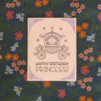 Birthday card with a carriage illustration and 'Happy Birthday Princess!' text on a floral patterned background.