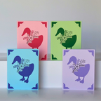 Four colorful greeting cards with goose designs on a white background
