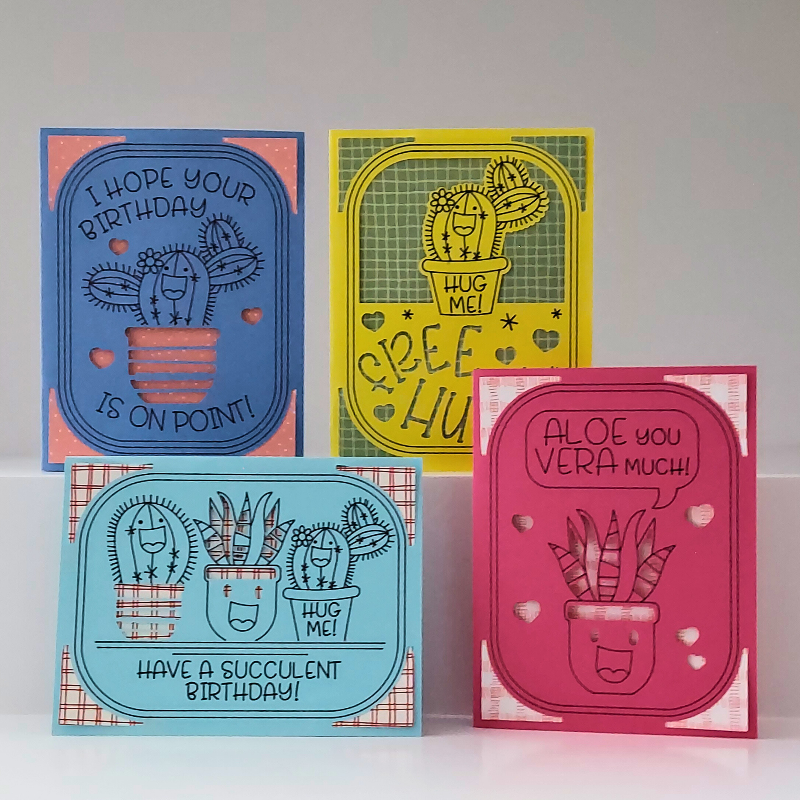 Four colorful greeting cards with succulent-themed designs on a white background