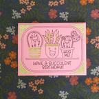 Pink card with succulent illustrations and text on a floral background