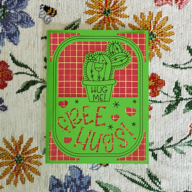 Card with a cactus illustration and text 'Hug Me! I Free Hugs' on a floral background