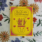 Yellow card with aloe vera illustration and text on a floral background